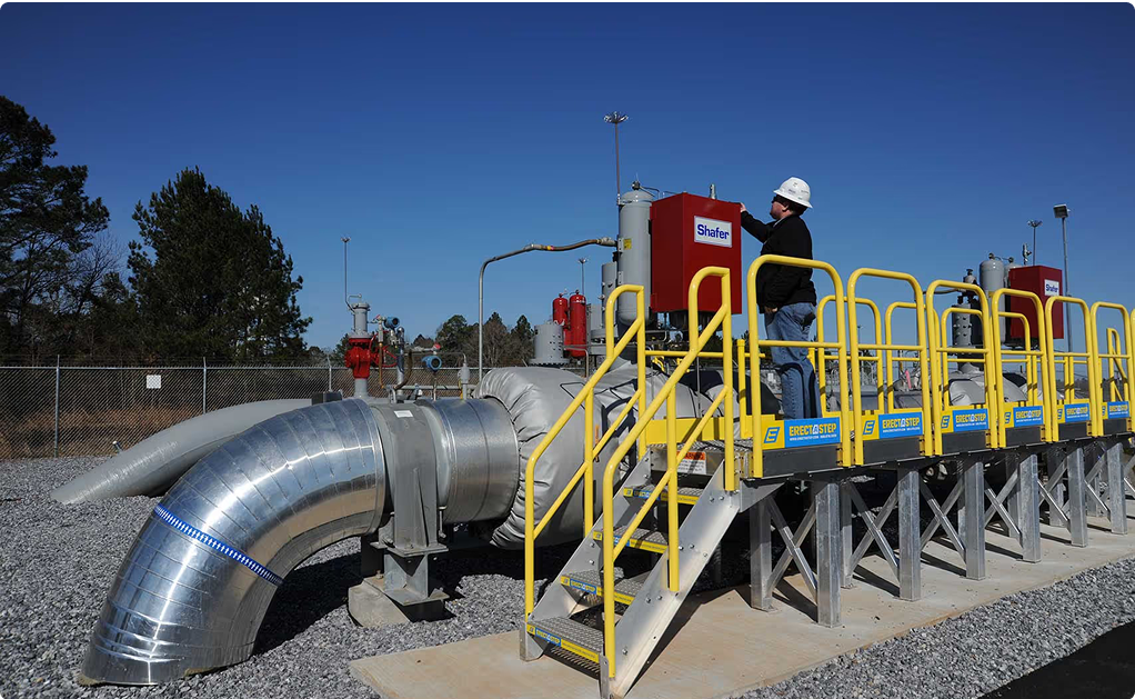 Technician inspecting equipment at a Boardwalk facility
